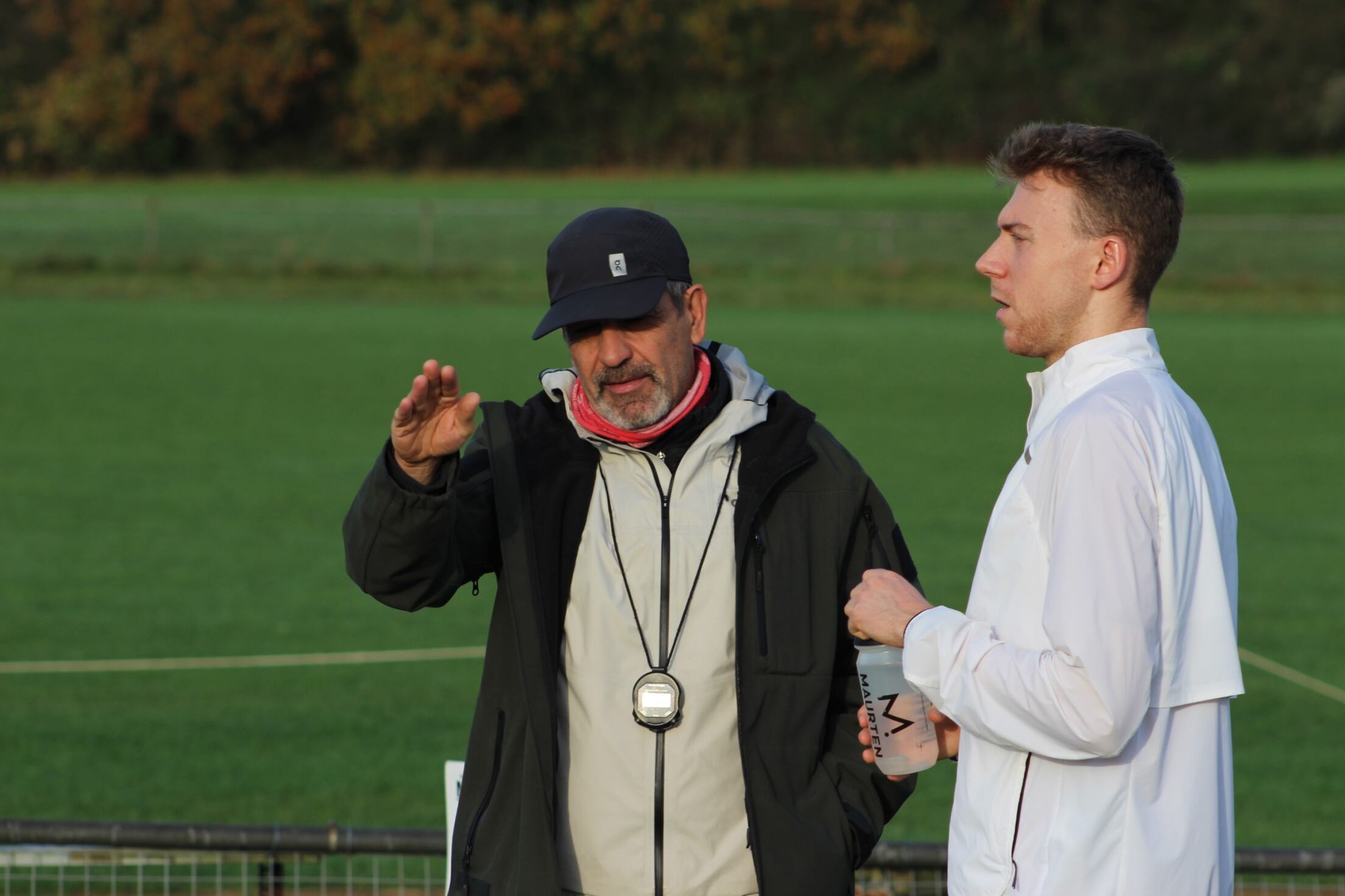 Neil Danby discussing a training session with an endurance athlete
